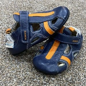 Robeez first walker shoes.